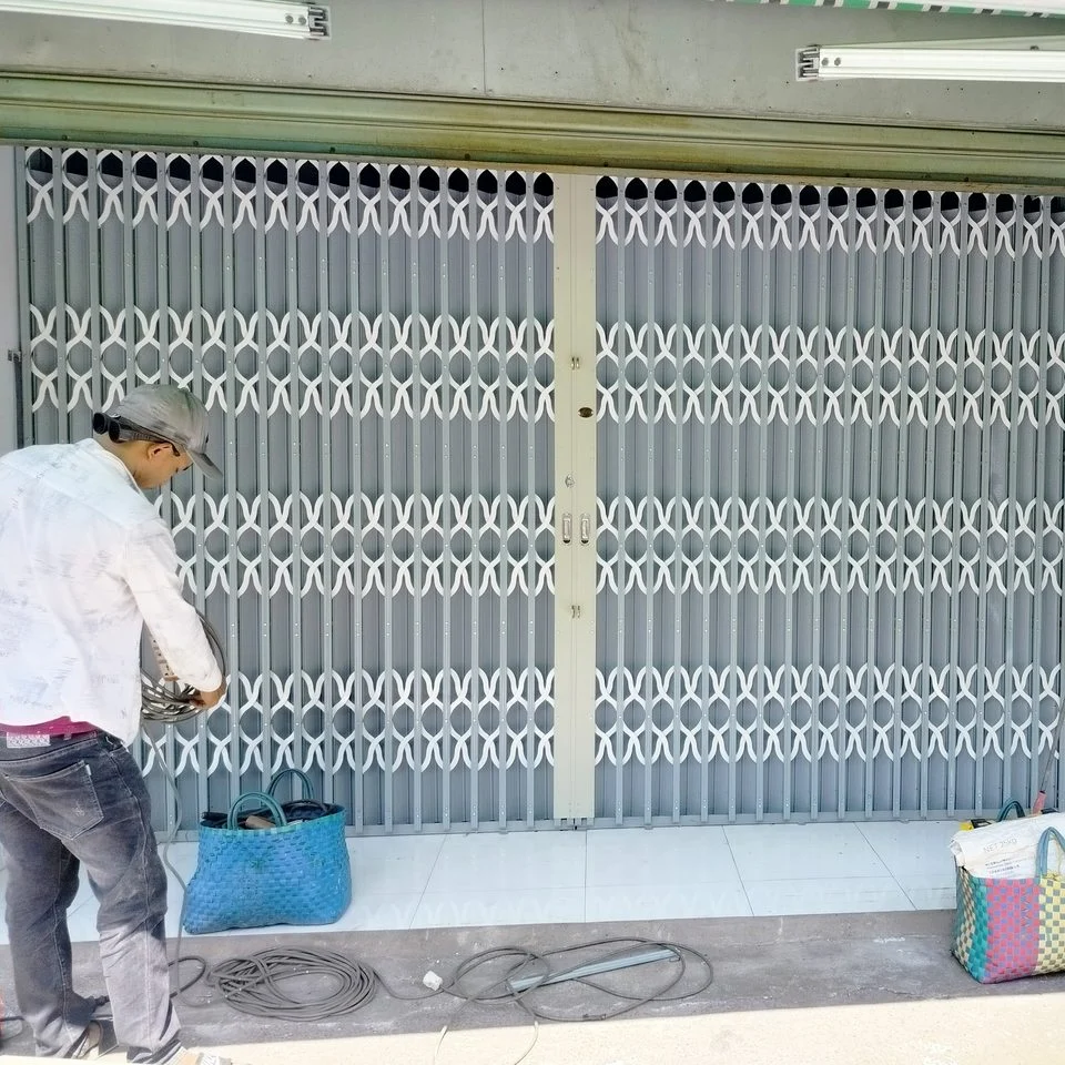 Thợ Pro-Metal sửa cửa kéo sắt tại nhà TP.HCM